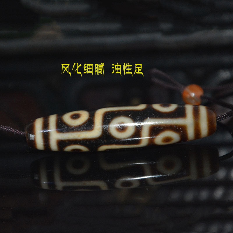 Tibetan Natural Dzi Bead Pendant with Weathered Pattern and High-Gloss Nine-Eyed Design