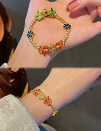 Ancient-Style Sand Gold Bracelet with Enamel-Blue Fired Butterfly Charm