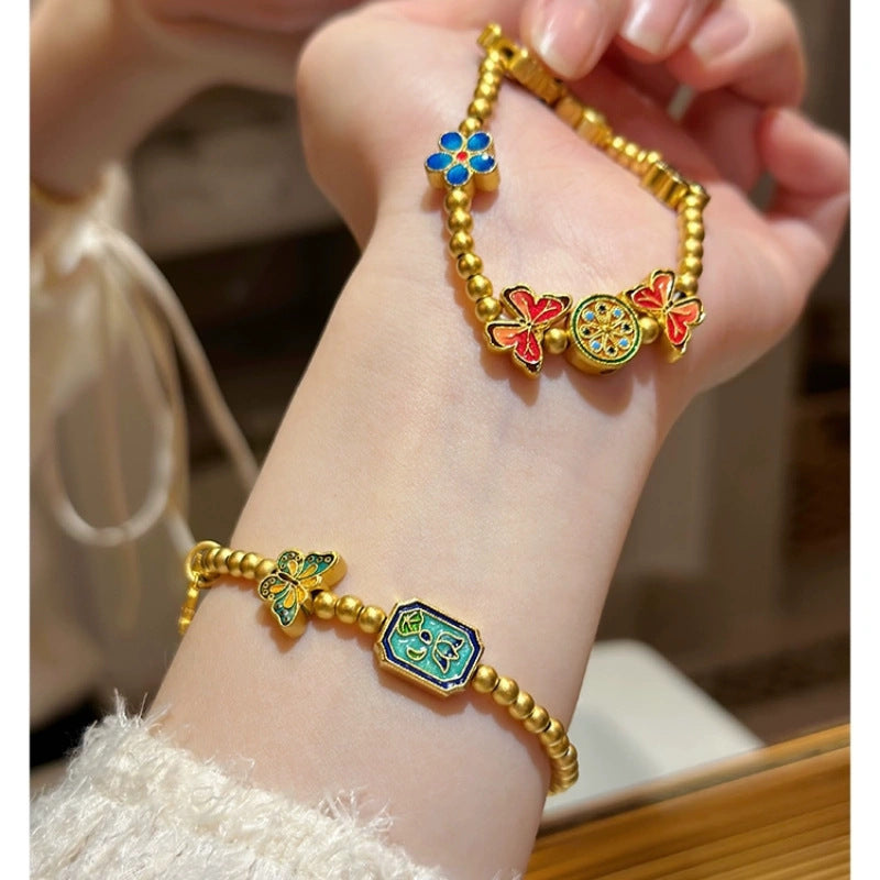 Ancient-Style Sand Gold Bracelet with Enamel-Blue Fired Butterfly Charm