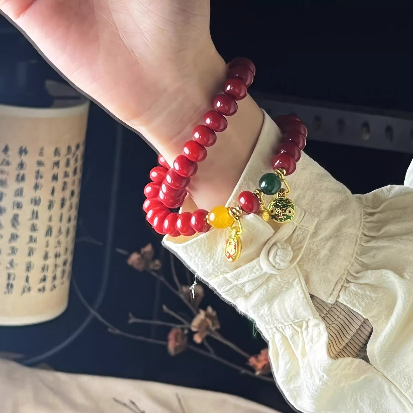 Natural Red Bodhi Root Abacus Bead Bracelet with a Family of Three Golden Pixiu Design, Double-Layer Strand.