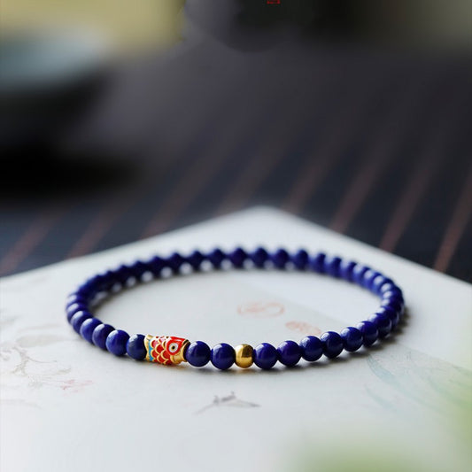 Lapis Lazuli Bracelet with Sand Gold Koi Fish and Spinning Beads