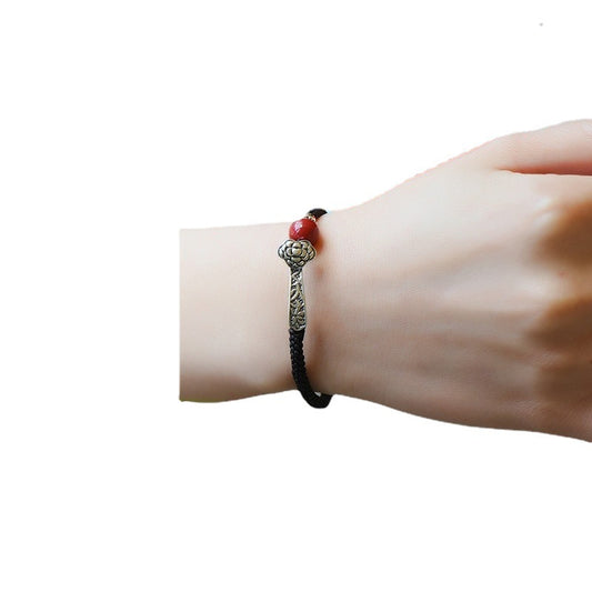 Cinnabar Bead Bracelet with Silver Ruyi and Red Cord